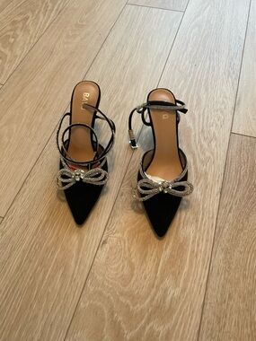 Women's Black Pointed Slingback Heels with Crystal Bow Accent